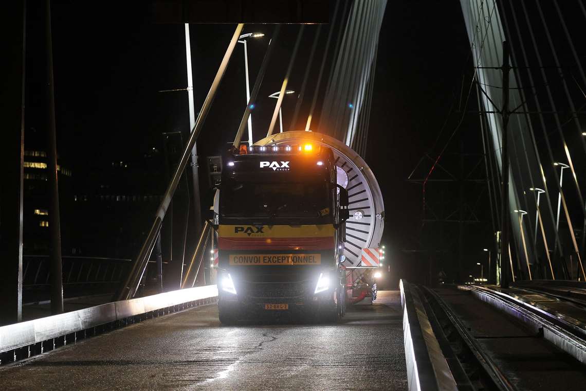 One of the PAX Group Volvo tractors coming over a bridge at night