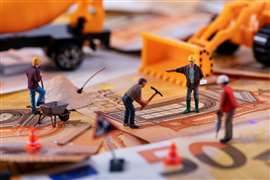 A miniture model of construction workers on a construction site