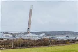 The Holyhead chimney a split second after the blast, tipping over