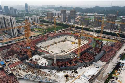 An aerial view shows the construction site of Guangzhou Evergrande Football Stadium, a stadium for Guangzhou FC, developed by China Evergrande Group, in Guangzhou, Guangdong province, China, Sept. 26, 2021