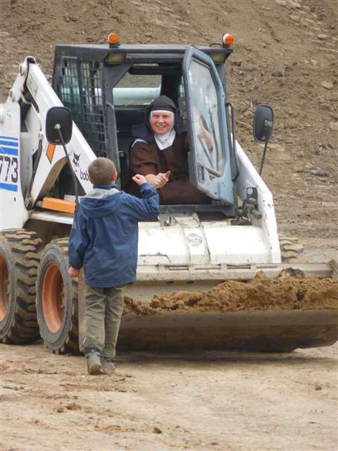 Sister Terezka quickly learnt to operate the Bobcat 773 loader (Photo: Bobcat)