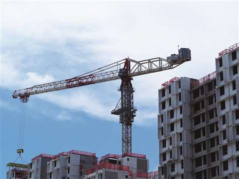 A Jaso crane working on PPVC modular residential units.