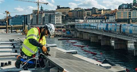 Skanska is testing a new solution with solar cells on construction sheds as part of a 140m steel bridge it is building in the centre of Stockholm 